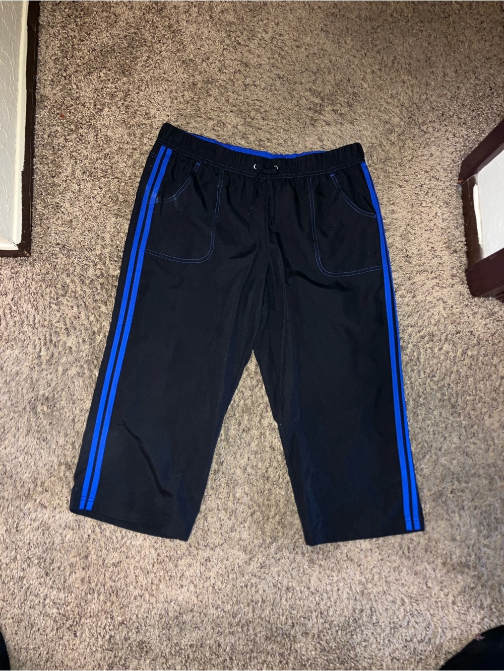 Women's Black Cropped Track Pants with Blue Side Stripes